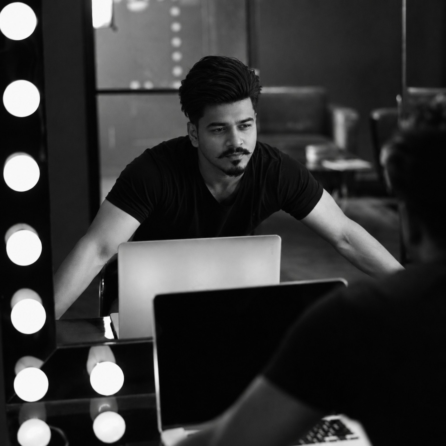Sanzat Hasan Tuhin working with a laptop